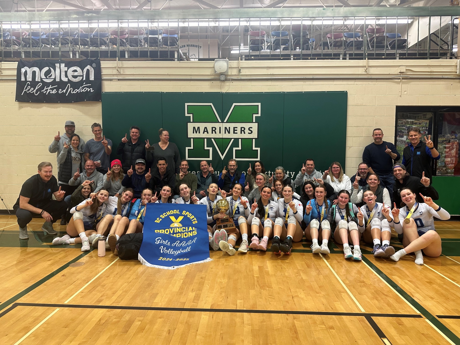 Team and family photo of 4A Girls Volleyball Champions from OKM